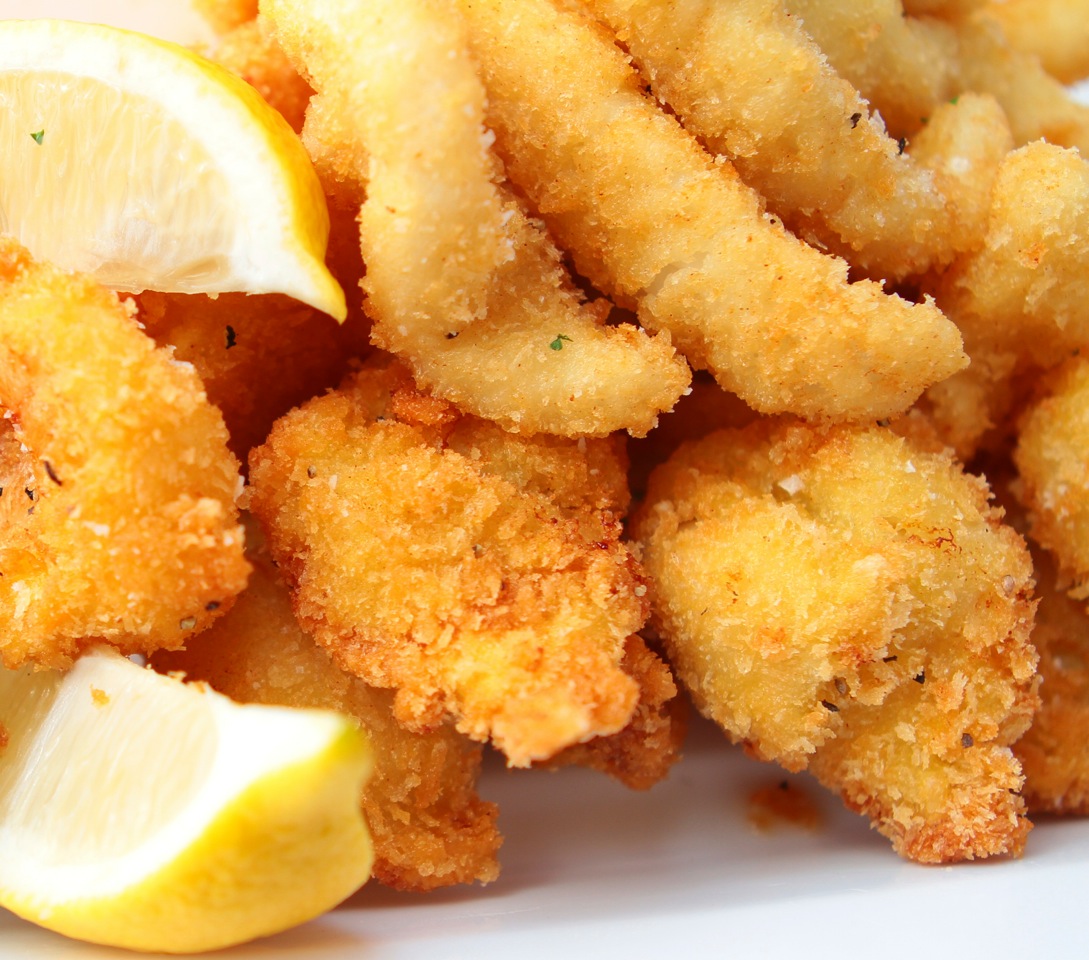 Crumbed, crunchy, succulent cooked seafood platter for 2 or 4 people
